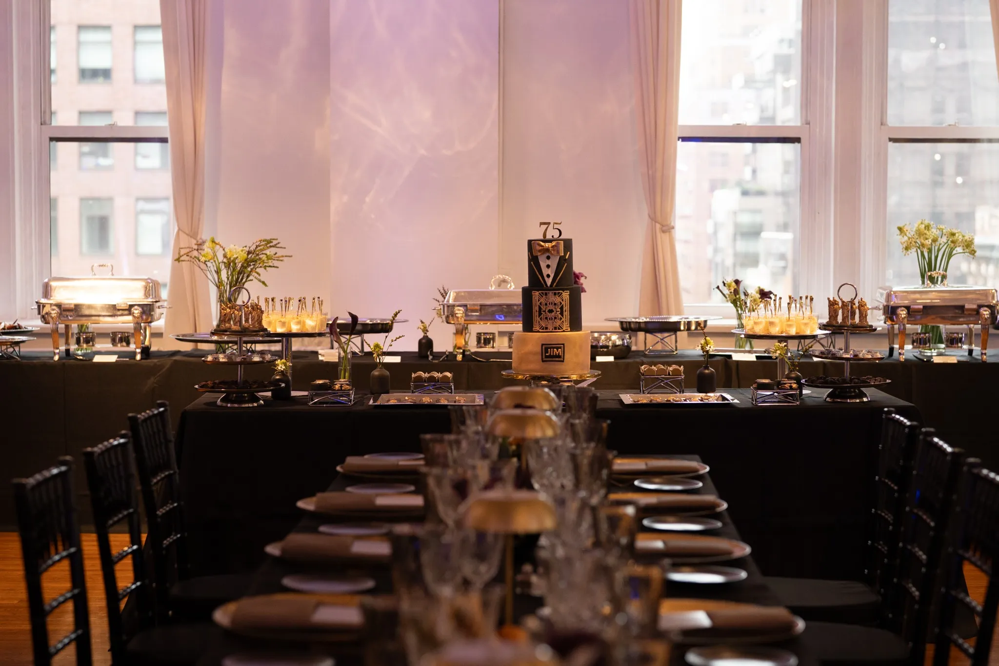Elegant dessert table with a beautifully decorated cake