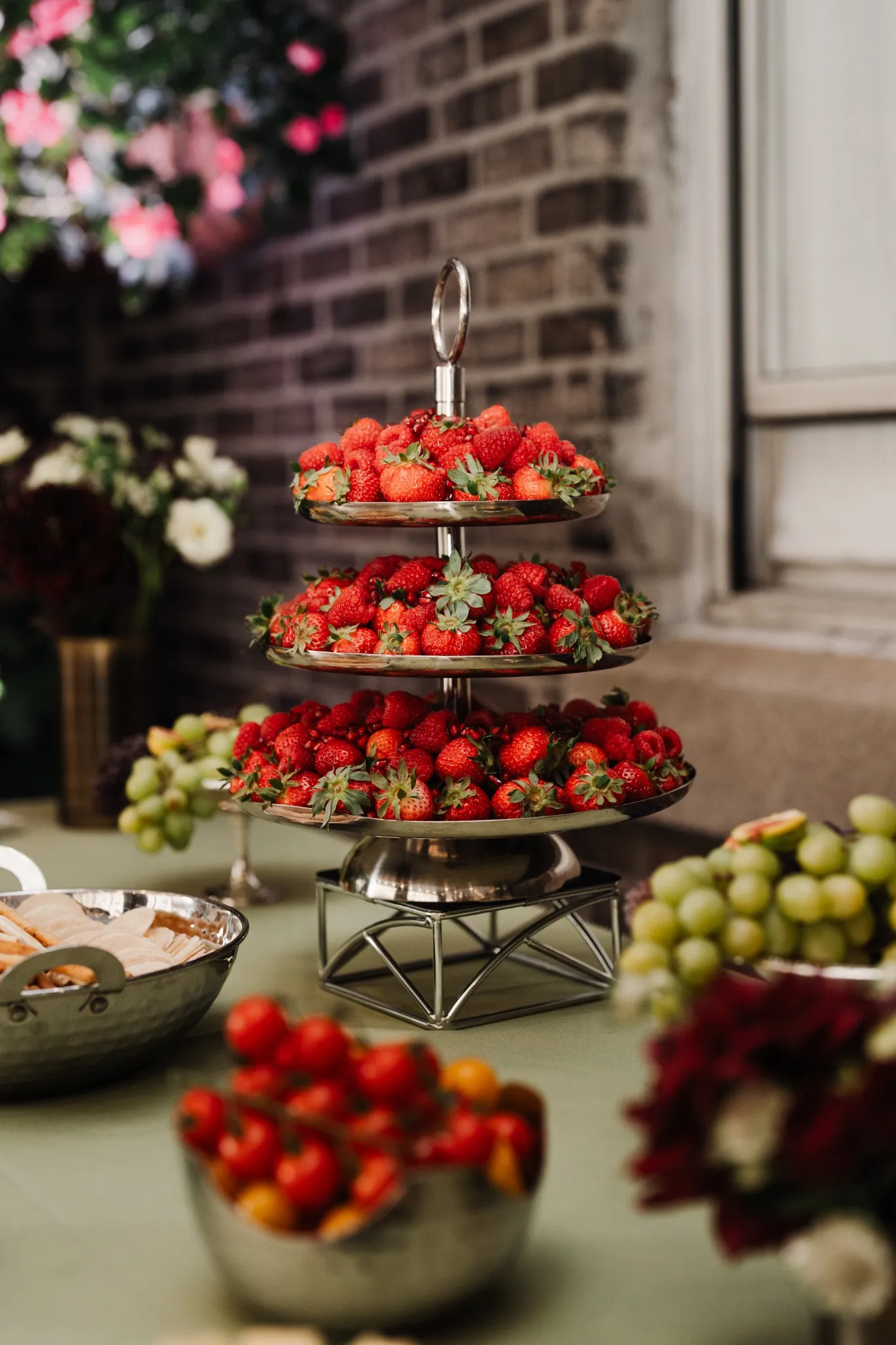 Delightful fruit display with fresh strawberries and fine tableware